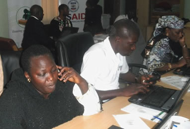PSC members at headquarters take reports from observers in the field