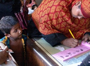 Mother and child cast their ballot