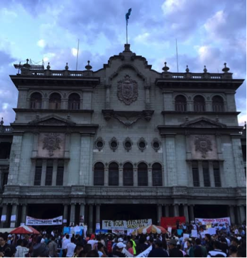 Protesters demonstrate against corruption in front of Guatemala’s National Palace.