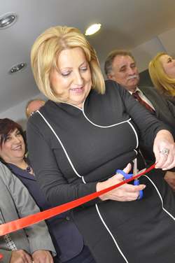 Slavica Dukic Dejanovic, president of the National Assembly, cuts ribbon at office opening