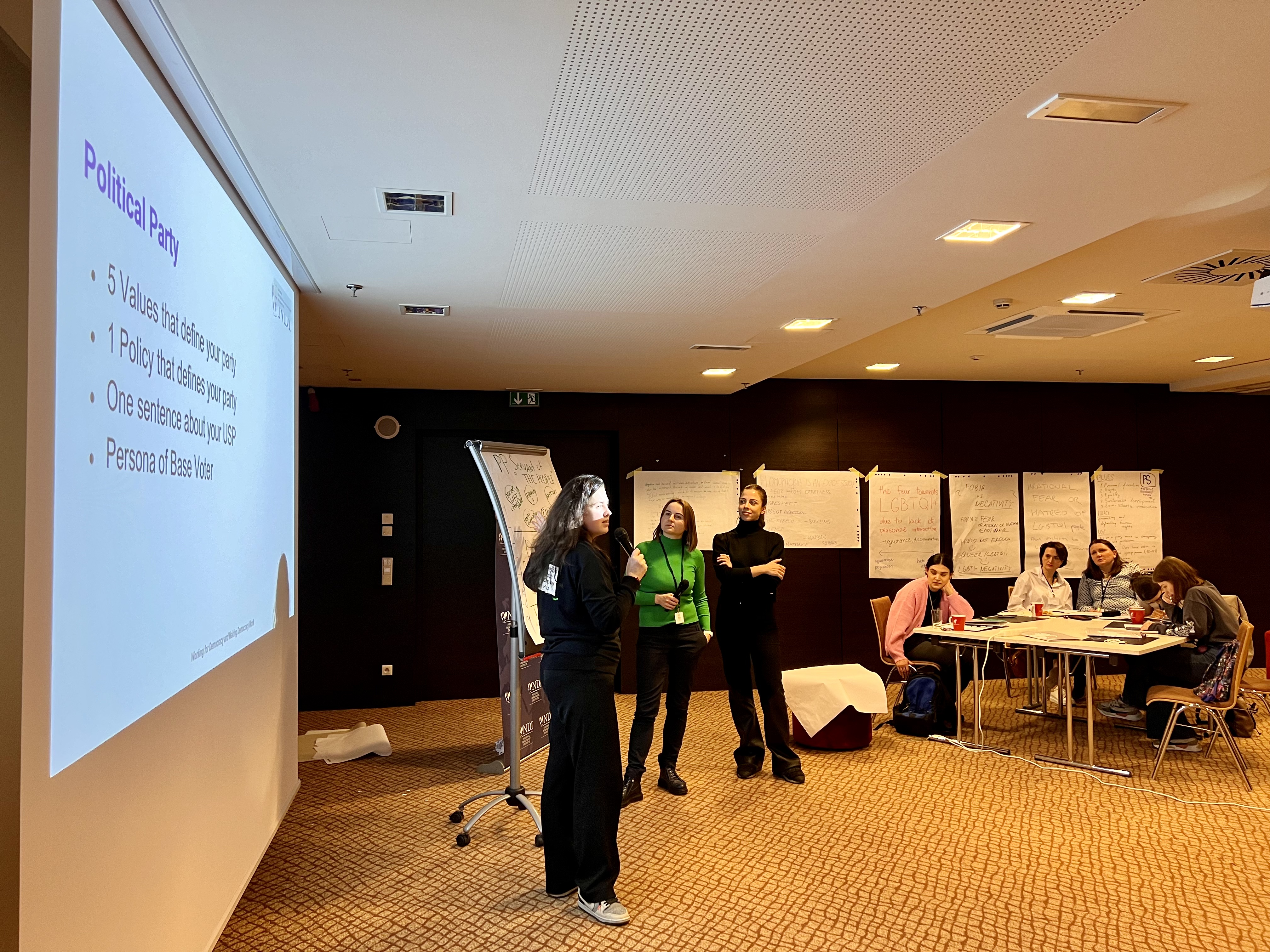 Pictured: Training participants presenting their political parties’ key values around inclusion.