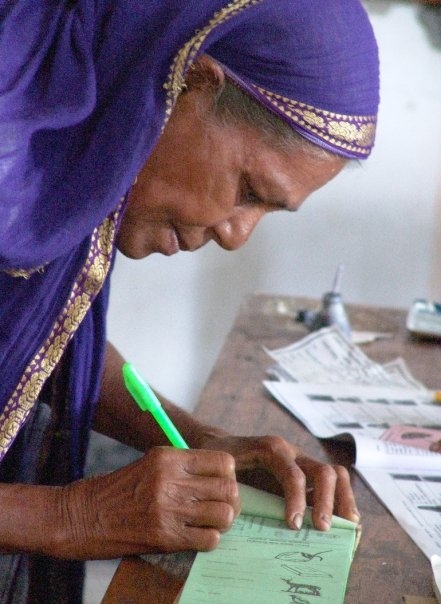 A woman in Bangladesh casts her vote