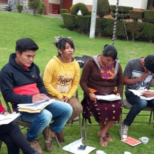 Milvia Roxana Lopez (third from left) speaks during a training for citizen election observers in Guatemala. “Self-confidence was key,” she said, referring to her ability to break through gender-based stereotypes as an election observer documenting inciden