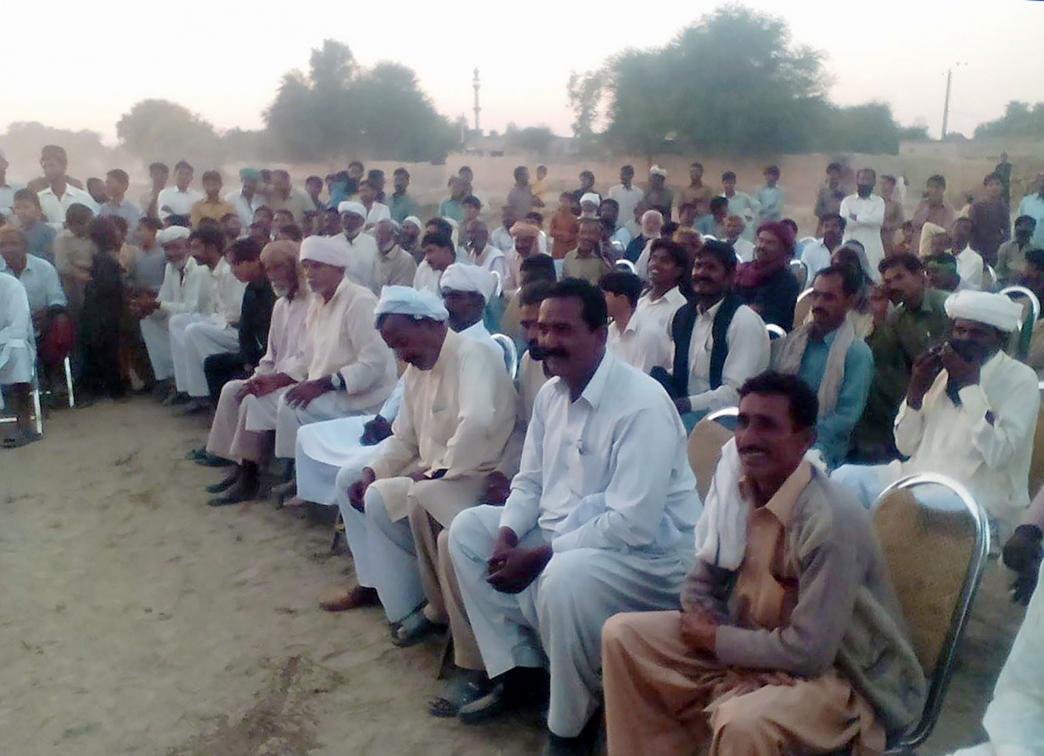 Khanewal District voters listen to candidates and consider who to support.