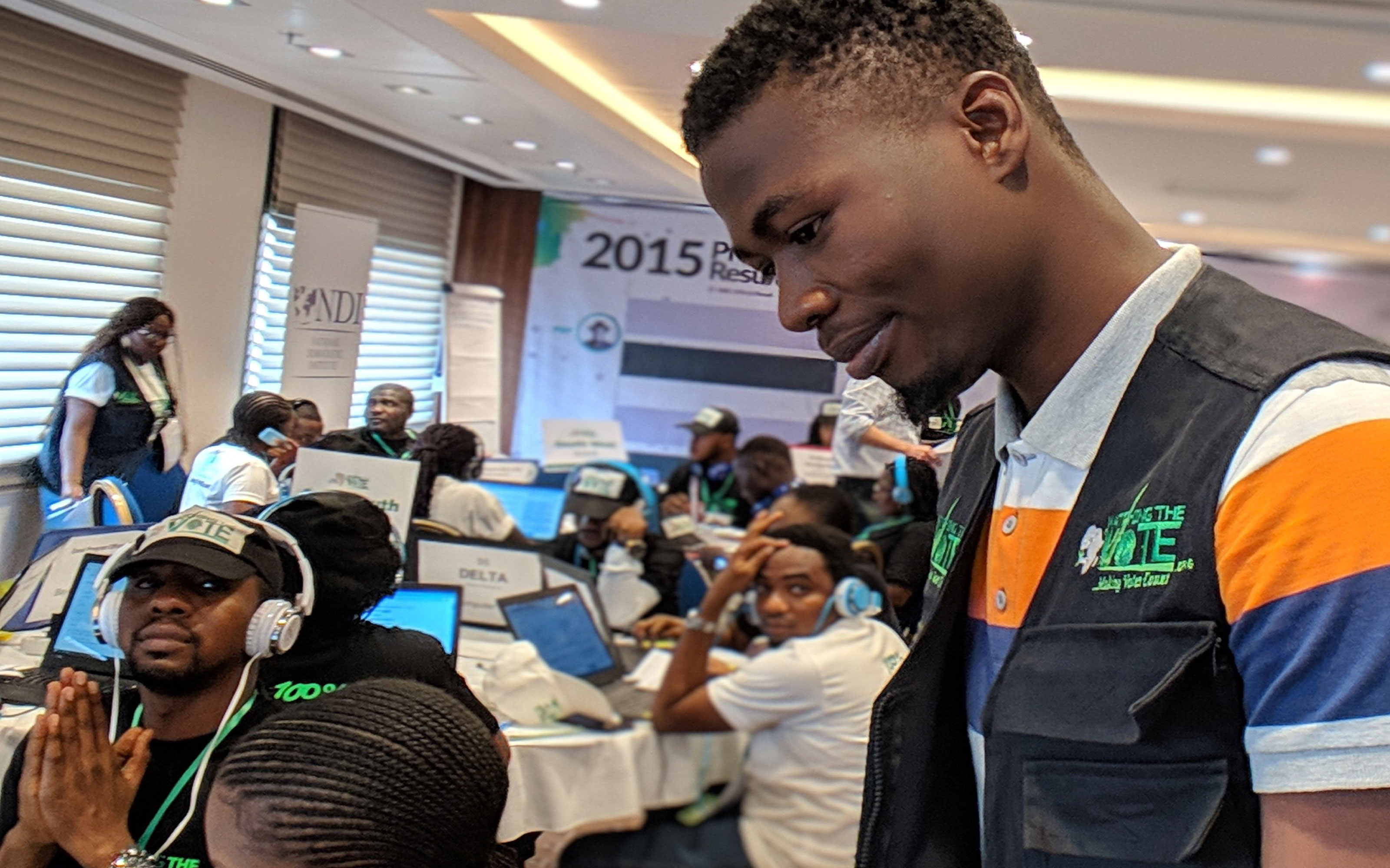 A YIAGA ICT officer works with data clerks on election day in Nigeria. February 2019.