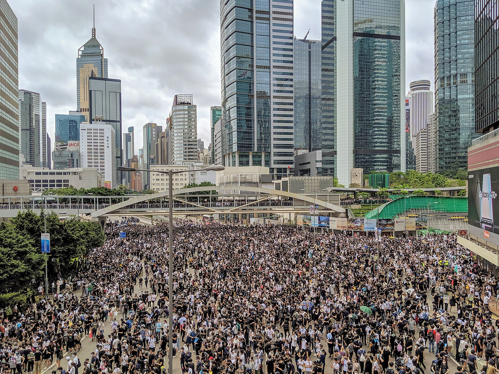 Tracking Hong Kong Public Opinion Across Social Media in Closing Democratic Spaces  