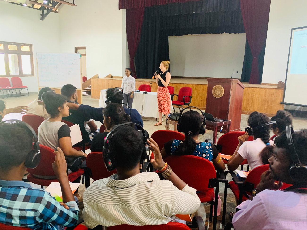 Beshadhi (Sarvodaya) and Kaitlin (NDI) discuss the importance of monitoring, evaluation and learning with the fellows. 