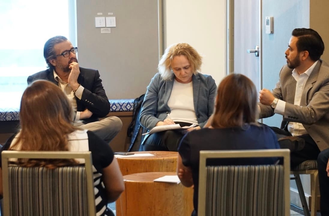 NDI staff, party representatives and legislative staff discuss ways to introduce candidate vetting initiatives to party leaders.