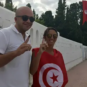 Tunisian voters display inked fingers indicating they&#039;ve voted in the September 15, 2019, presidential election.