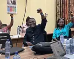 Members of the consortium express solidarity as they develop a shared action plan for citizen engagement at the local level