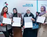 Participants with their Certificates of Graduation