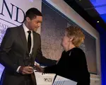 Madeleine Albright presenting award to Trevor Noah