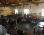 International Group Association (IGA) Accountability Club discussing health monitoring in Lilongwe Rural 