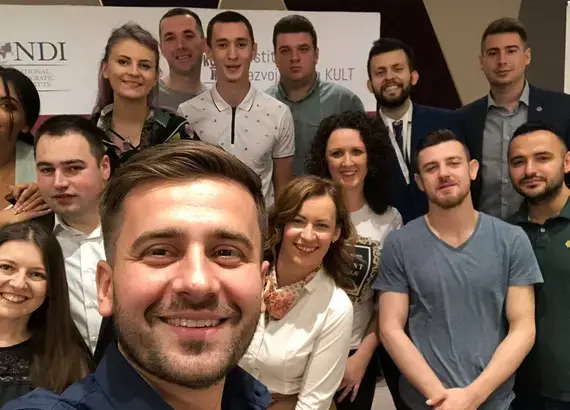 Young politicians from nine Bosnian political parties take a selfie