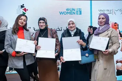 Participants with their Certificates of Graduation