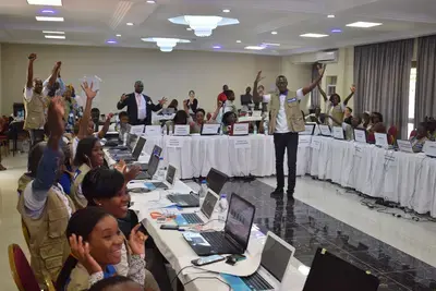 POECI supervisors celebrate the collection of final observer data on election day