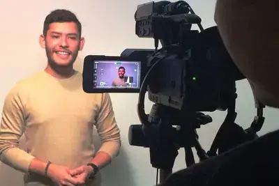 A campaign activist films a video as a part of the Vote for Equality campaign. The campaign brought together organizations from various marginalized populations to advocate together for equality.