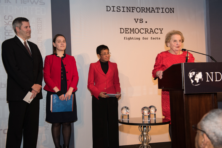Rappler CEO Maria Ressa receives NDI's Democracy Award from NDI Chair, Madeleine K. Albright, in November 2017, together with Margo Gontar, StopFake (Ukraine), and Philip Howard, Oxford Internet Institute’s Computational Propaganda Research Project (Unite